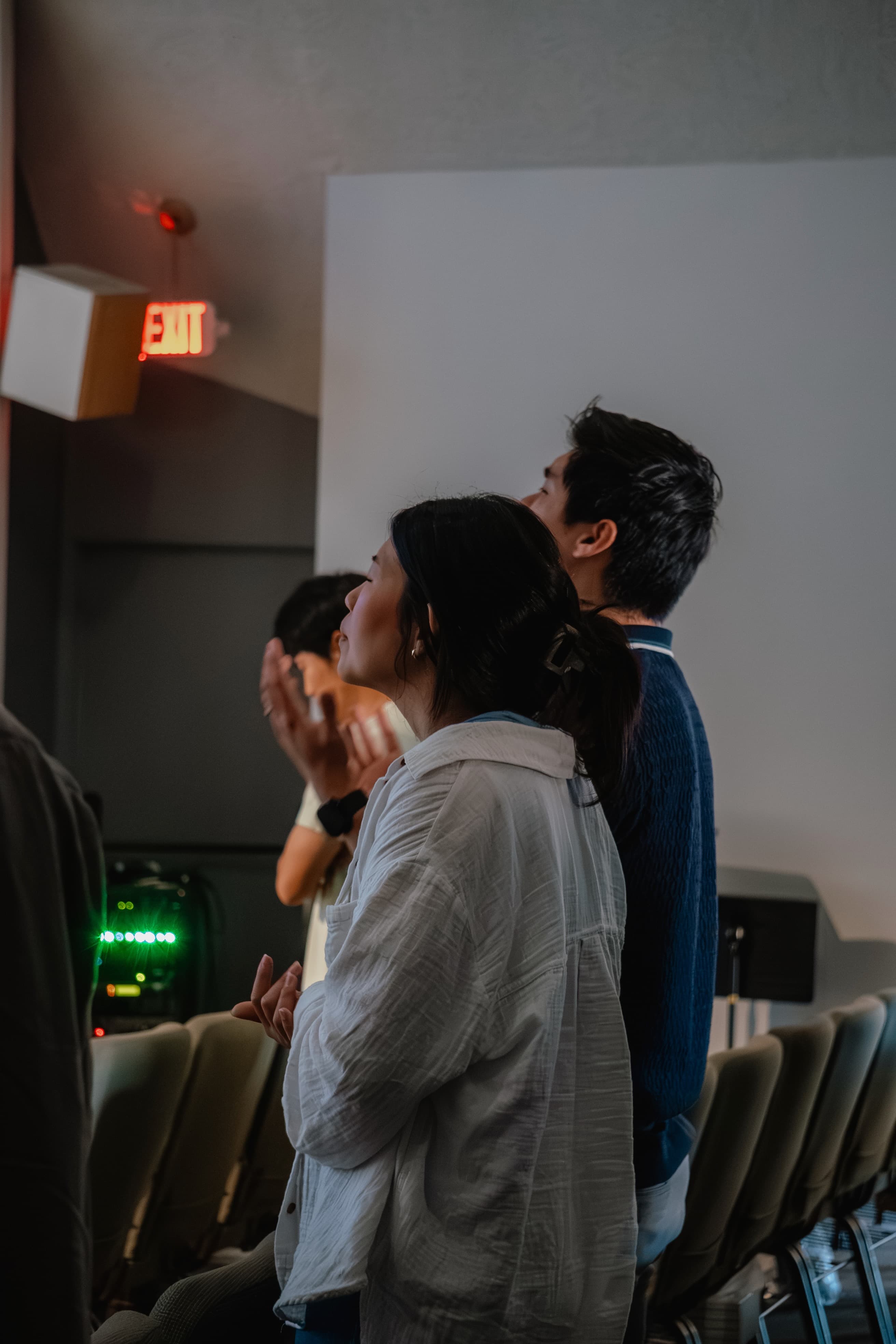 Couple worshipping together at 1128 Church