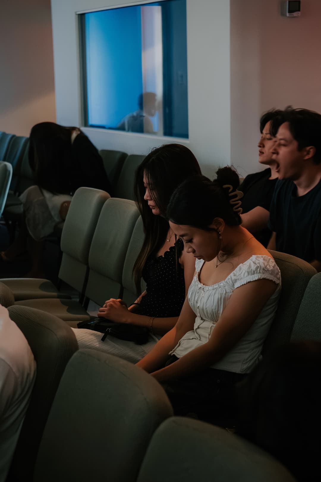Congregation seated in worship and prayer