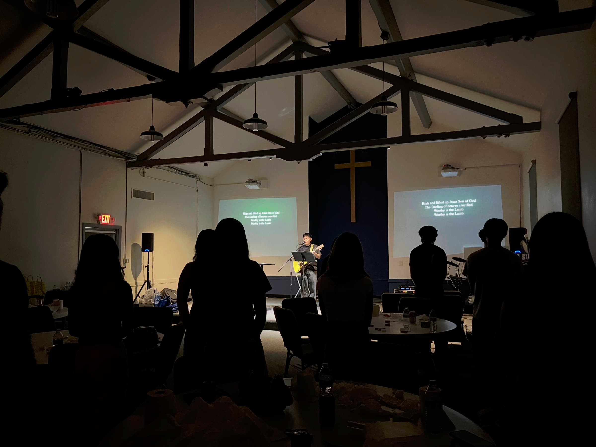 Worship during a Friday night 1128 College gathering